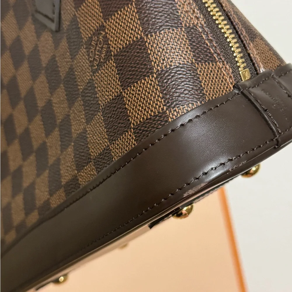 Louis Vuitton Mini Alma Bag - Picture 16 of 16